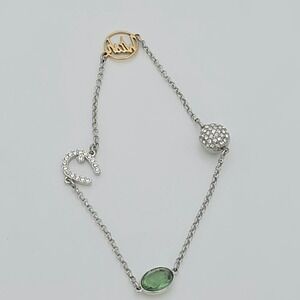 SWAROVSKI Signed Charm Bracelet Green Crystal Wish Horseshoe Rhodium Plate 6.75"